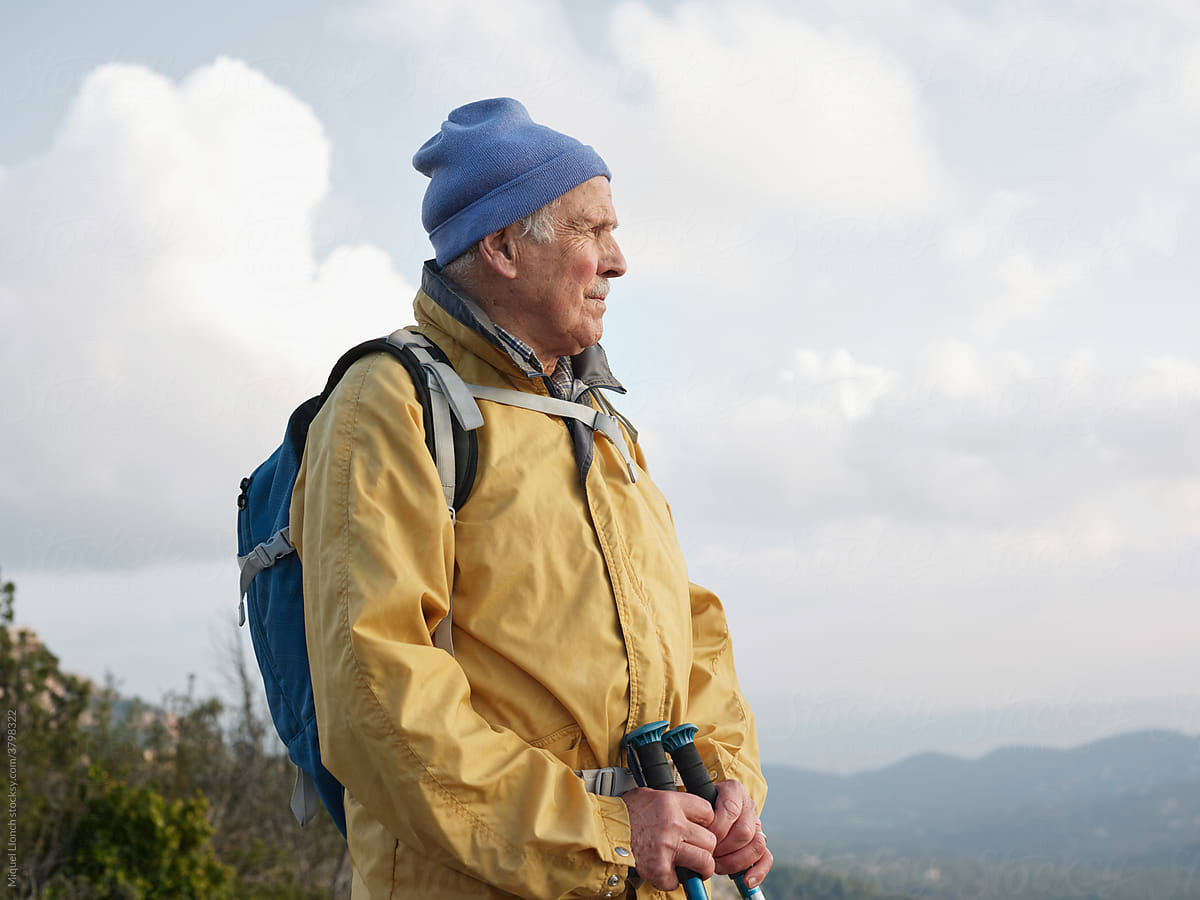 Senior hiker enjoying the mountain landscape