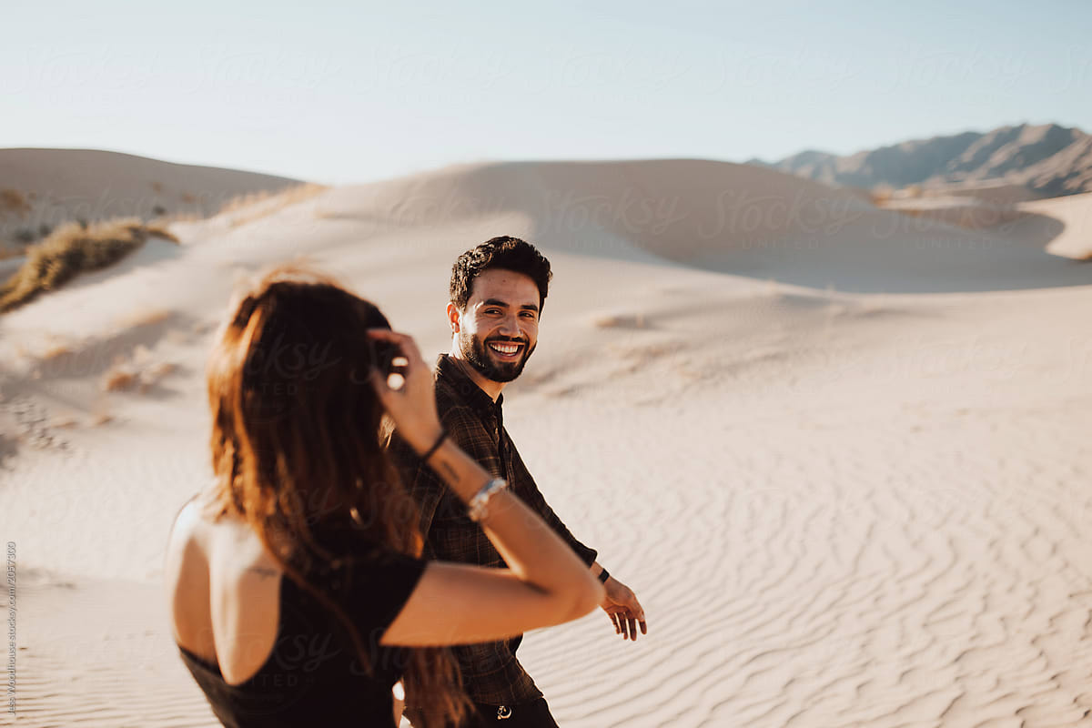 Couple walking together in the Desert