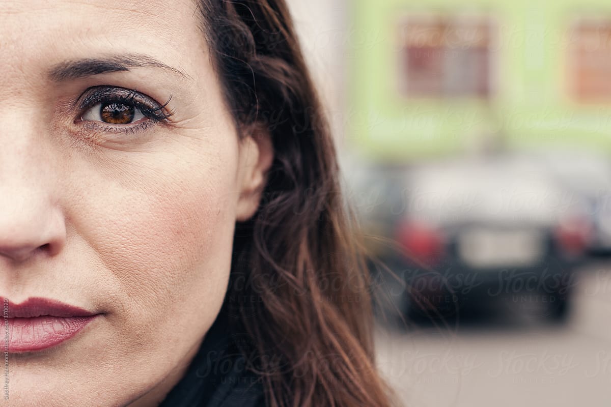 Close Up of Woman\'s Face in Parking Lot