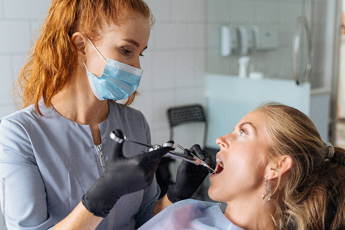 Dentist injecting anesthesia to patient