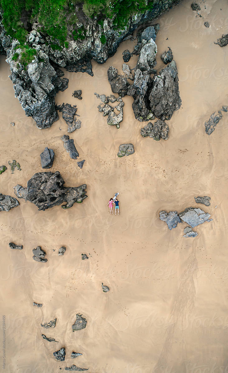 Aerial View Of A Couple In Love On The Beach By Stocksy Contributor Marco Govel Stocksy 