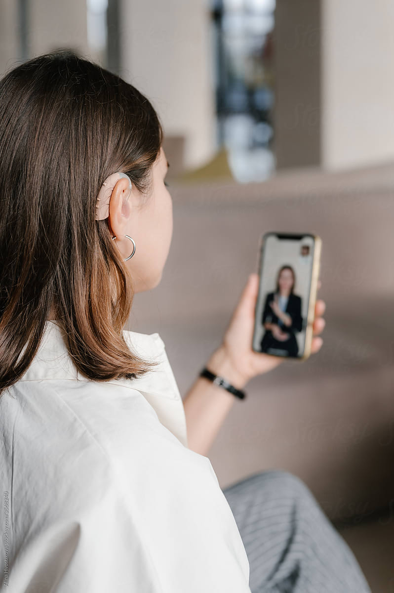 Deaf female entrepreneur making video call