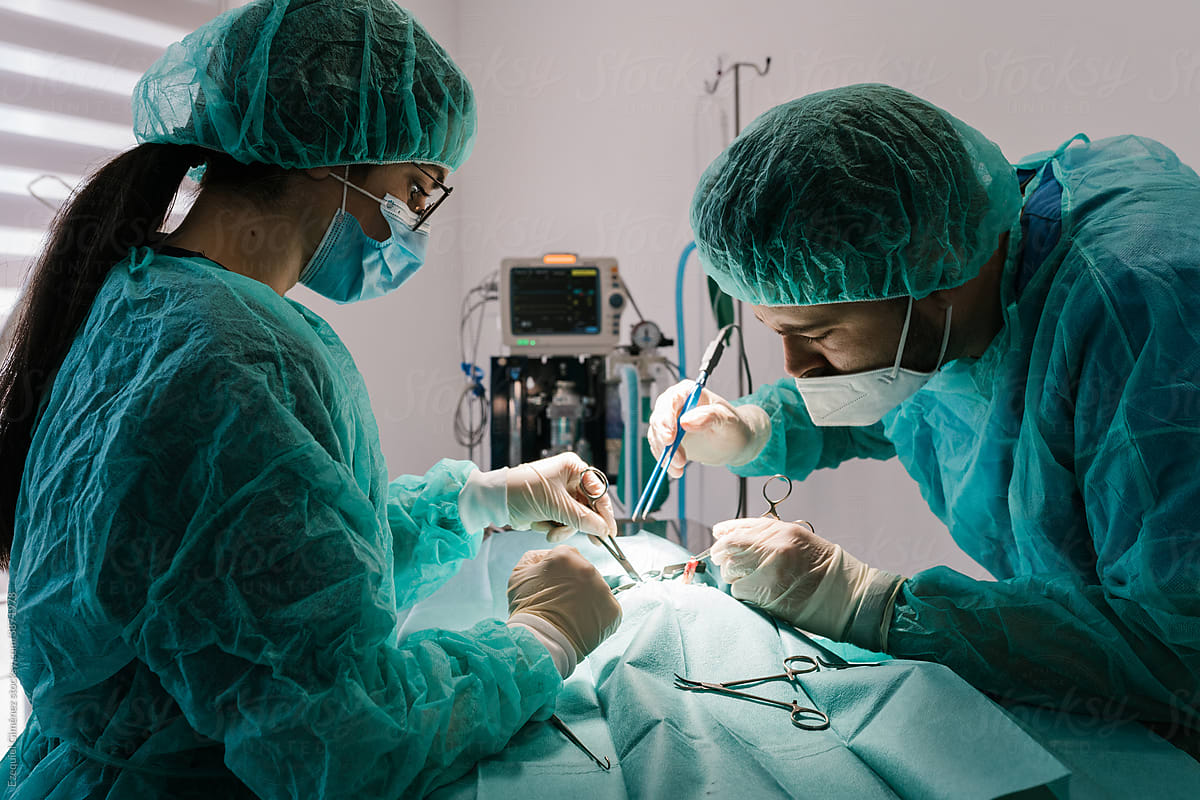 Team of surgeons performing a surgical procedure