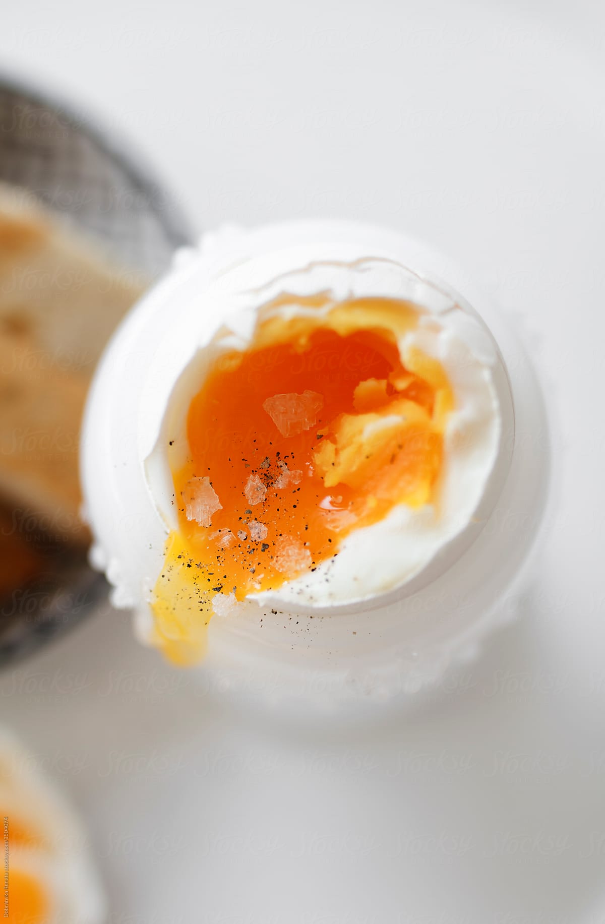 A soft-boiled egg with toast soldiers.