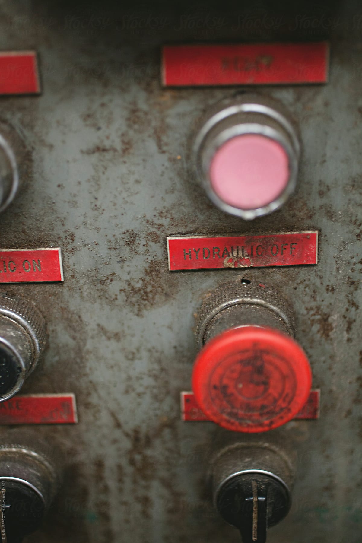 close up of buttons and knobs at a record pressing plant