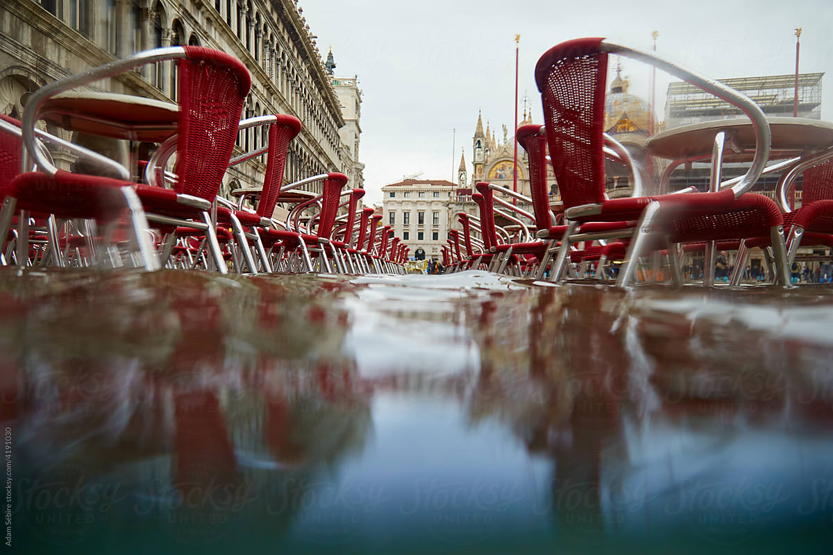 Tourist cafe seats deserted, underwater in Venice flood