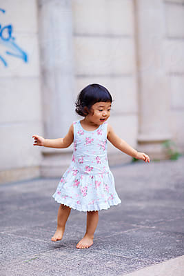 Lovely Asian Little Girl Outdoor by Stocksy Contributor Bo Bo - Stocksy