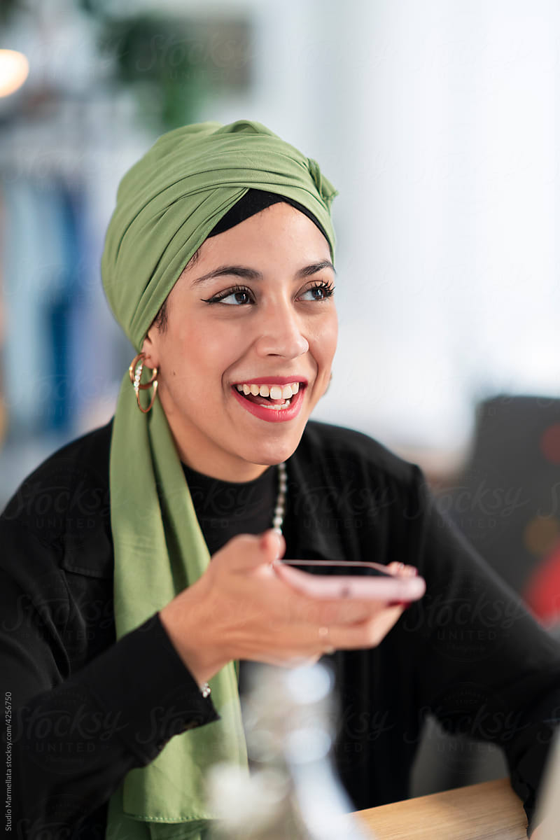 Arab freelancer sending voice message