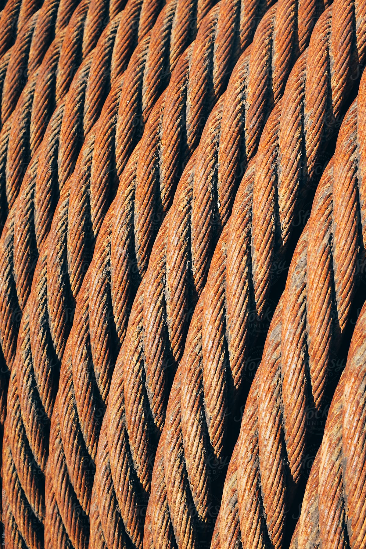 Close up rusty, metal cables used for commercial fishing