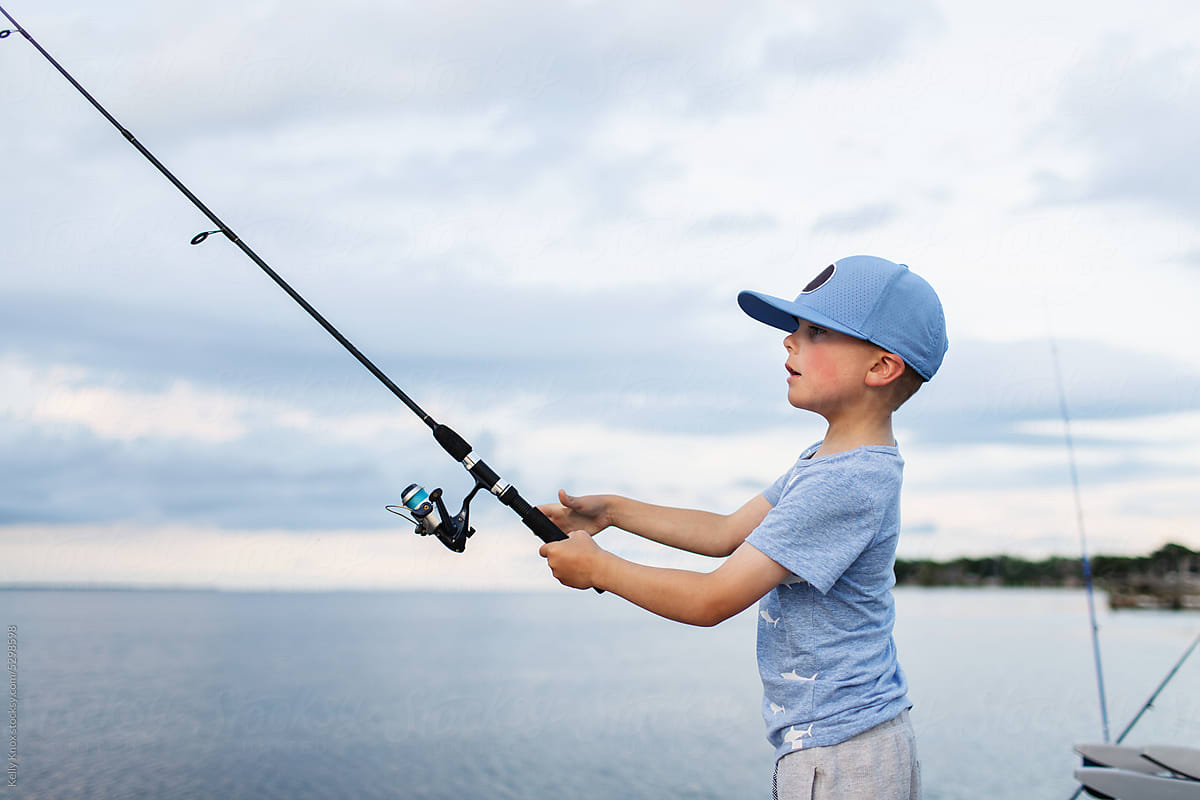 Series Of A Young Boy Fishing by Stocksy Contributor Kelly Knox