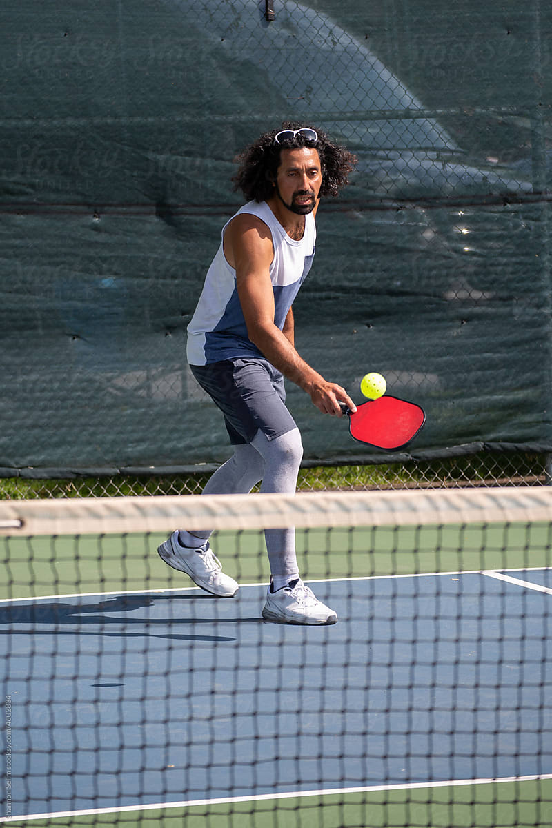 Middle Eastern Man Plays Pickleball