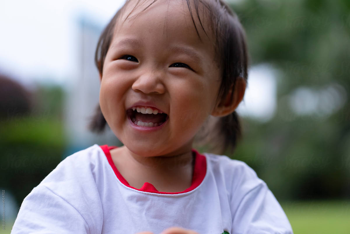 happy baby asian girl smile Close up