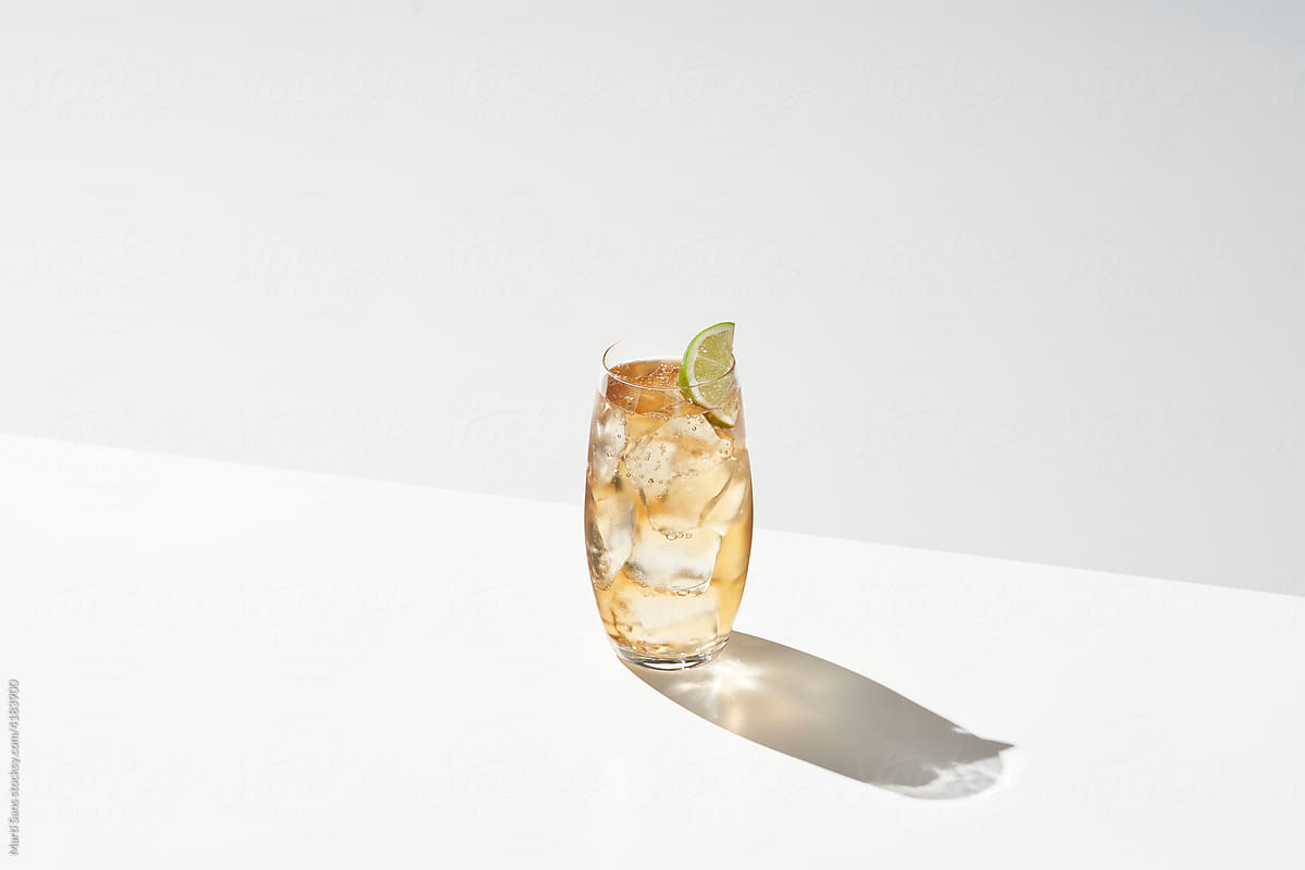 Dark n Stormy cocktail with lime