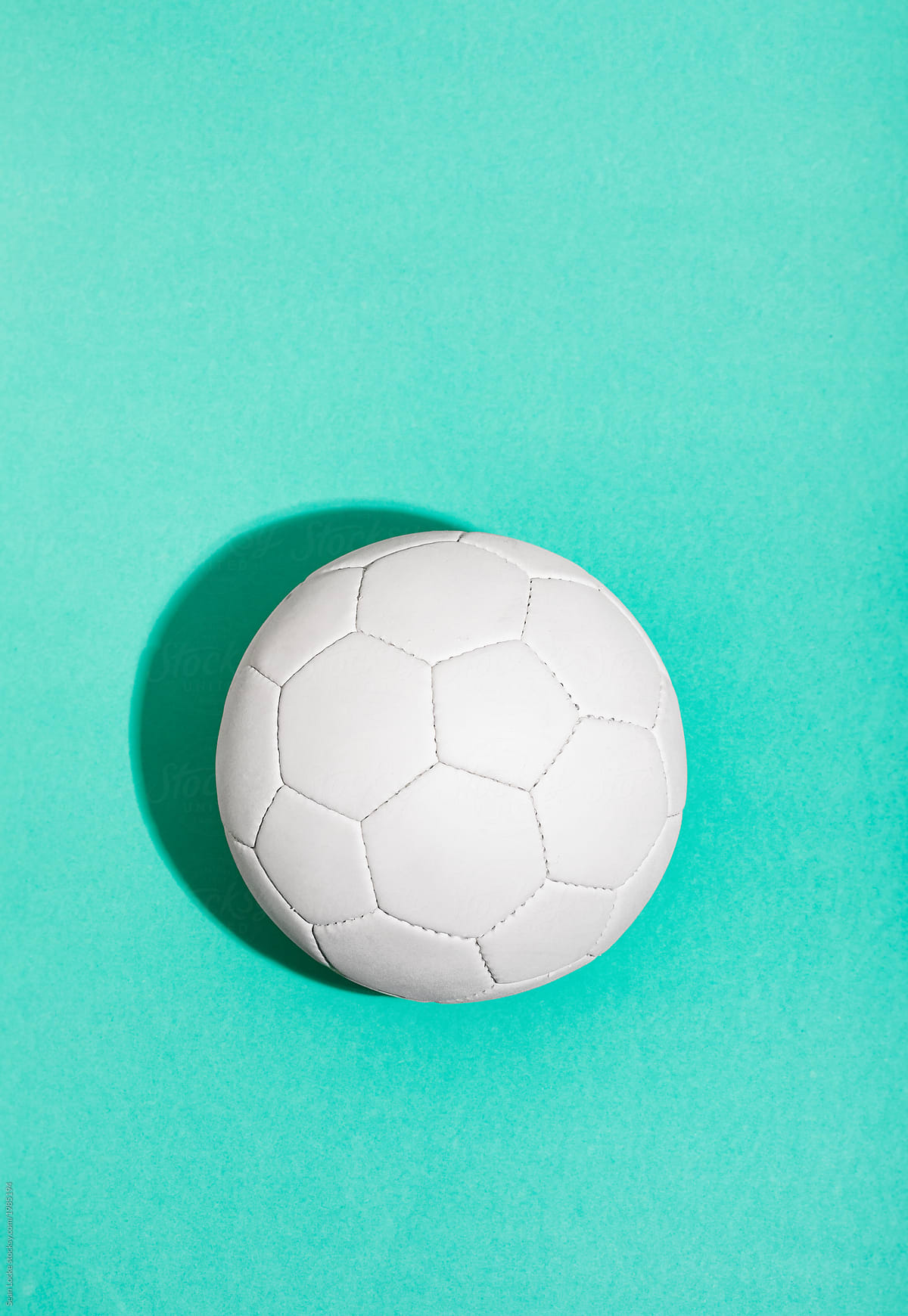 Soccer Ball On Sea Green Background