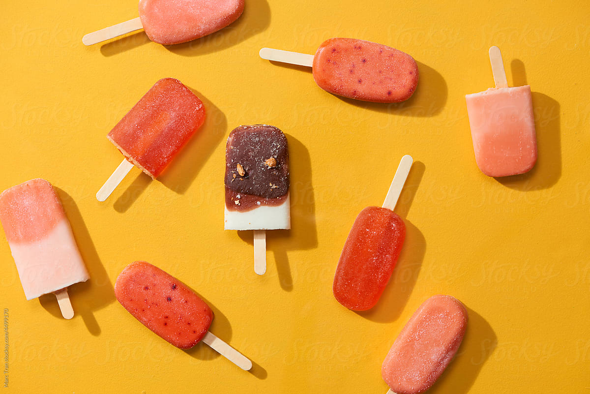 Colorful homemade popsicle with yogurt and berries