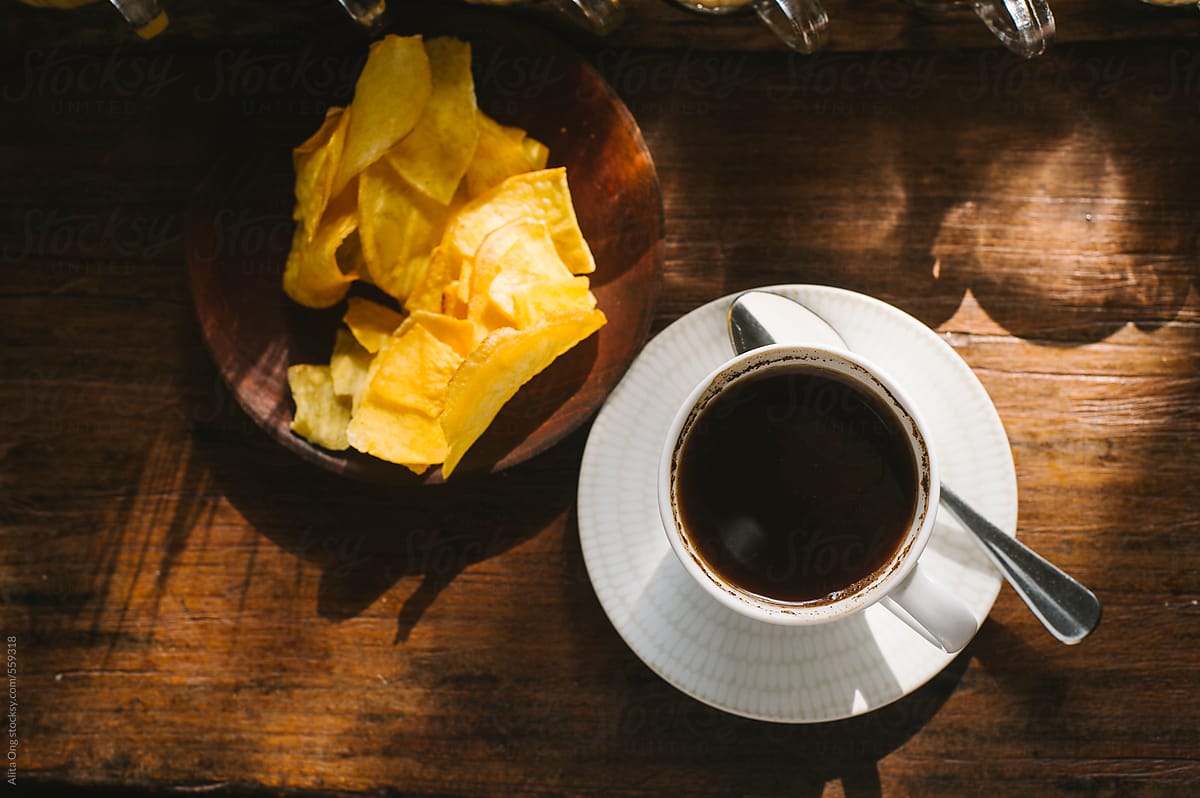 Indonesia civet coffee served with banana chips