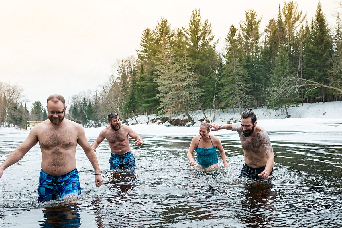 Friends Swimming In Ice Cold Frozen Winter River Polar Bear Dip
