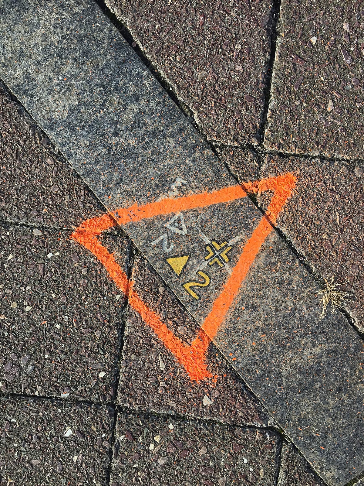 Close up of markings on sidewalk