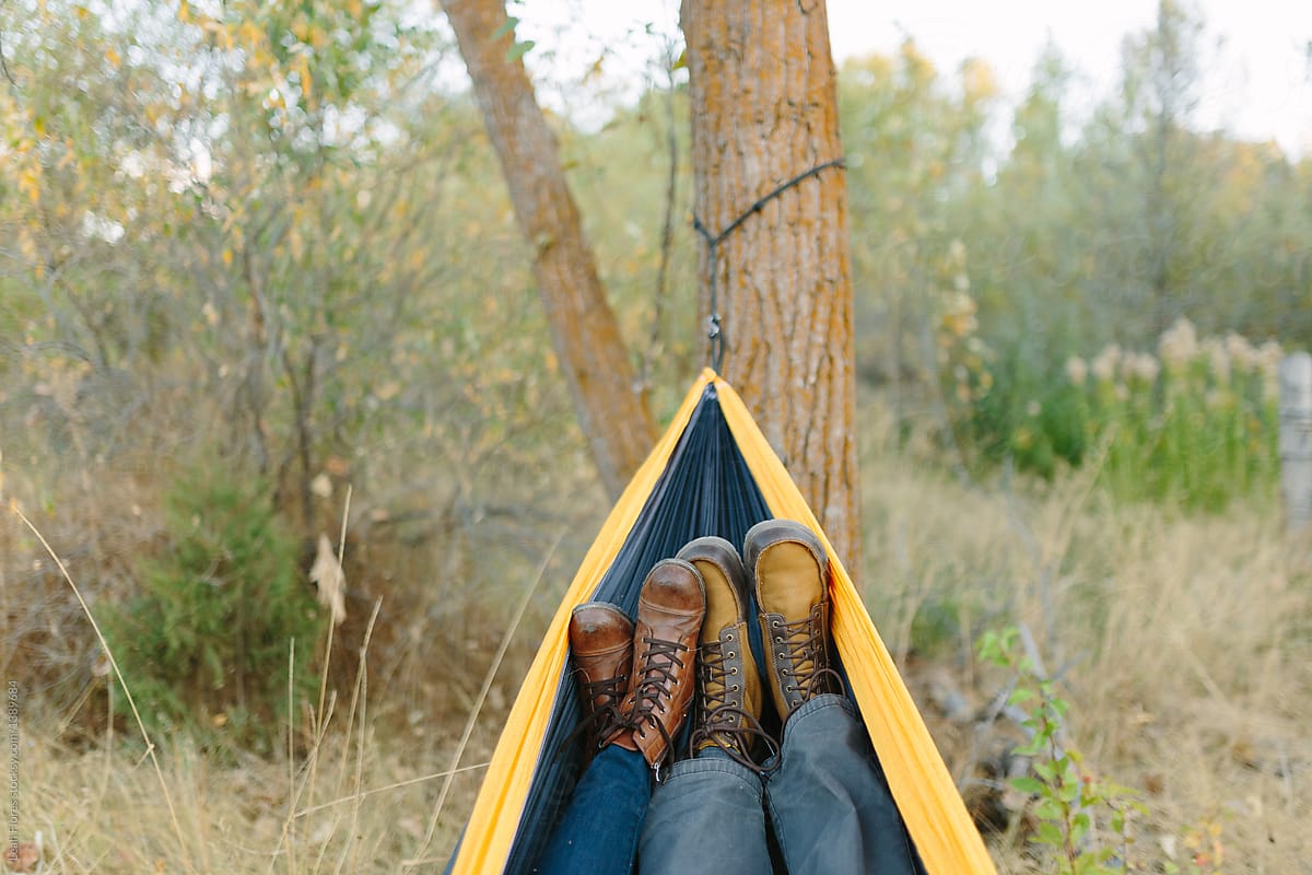 Couple\'s Feet Together in Hammock