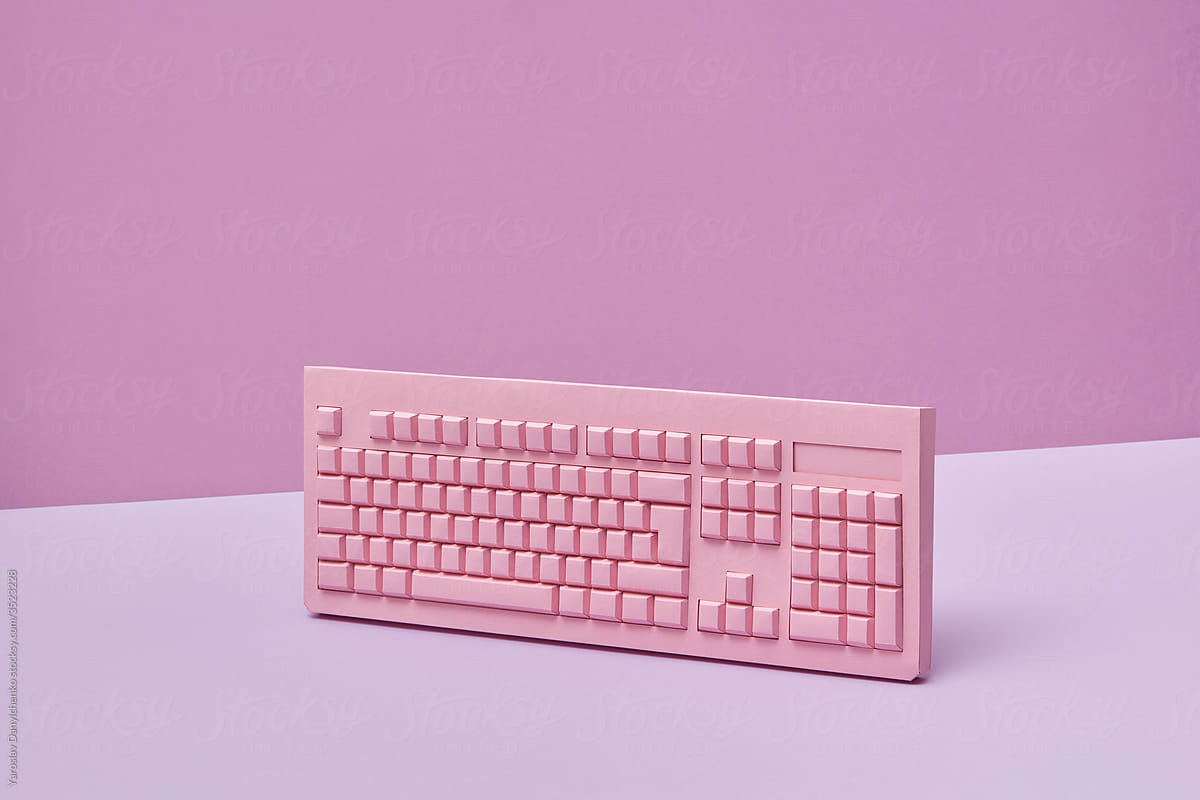 Computer keyboard handmade from pink paper.
