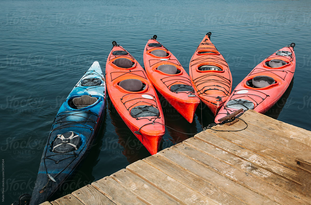 Colorful Kayaks on a Pier