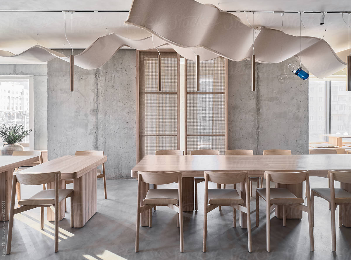Minimalist restaurant interior with wooden furniture