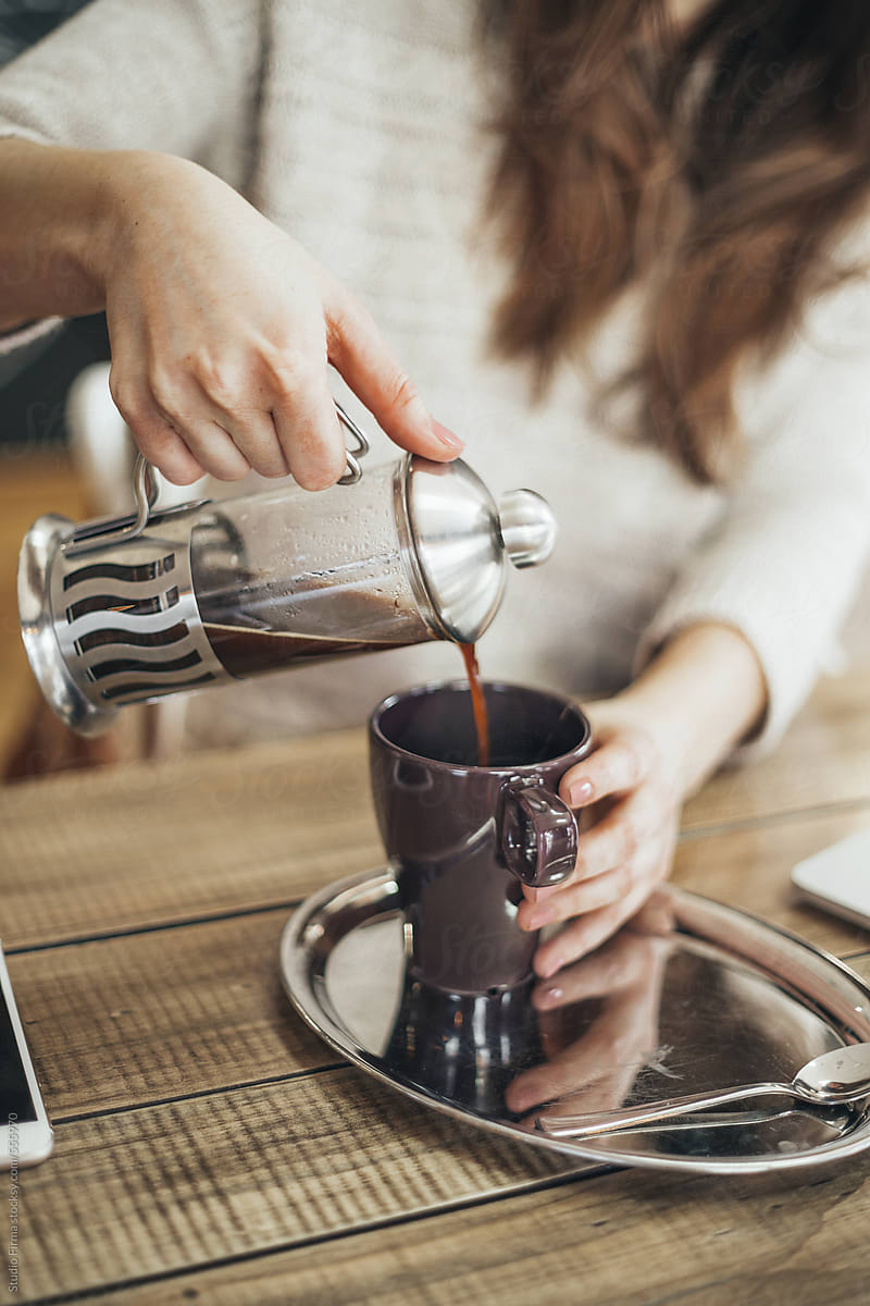 Woman Pouring Coffee