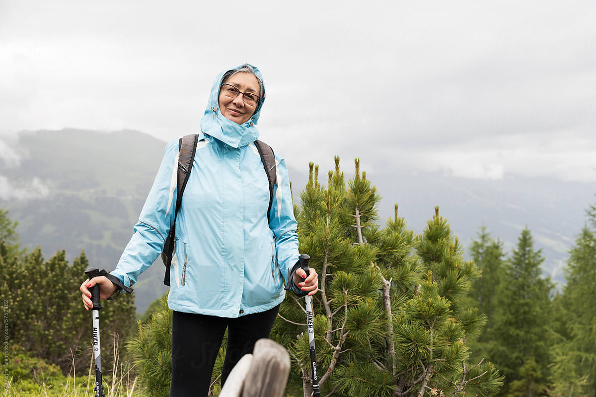 Senior woman hiking in the mountains