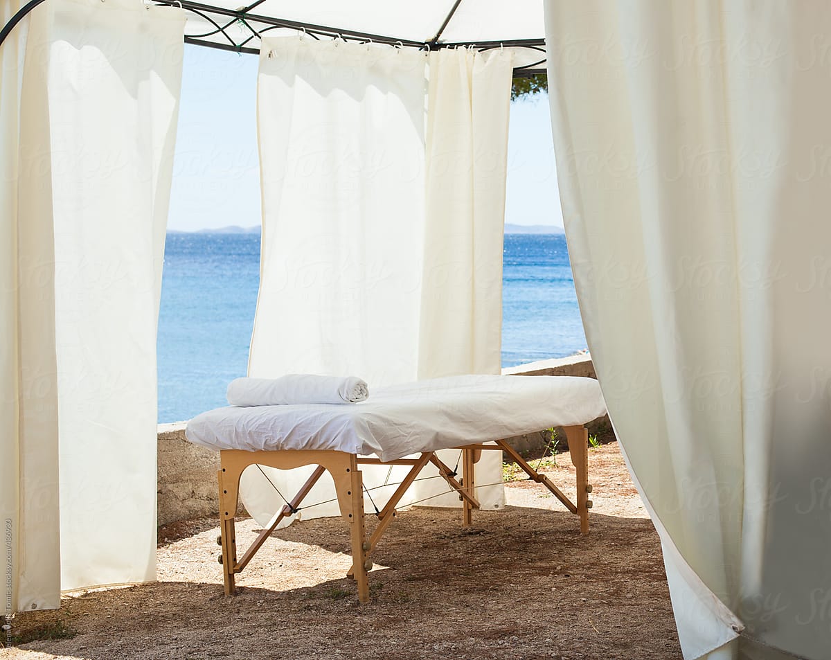 Massage Table In The Spa Resort By The Sea By Stocksy Contributor