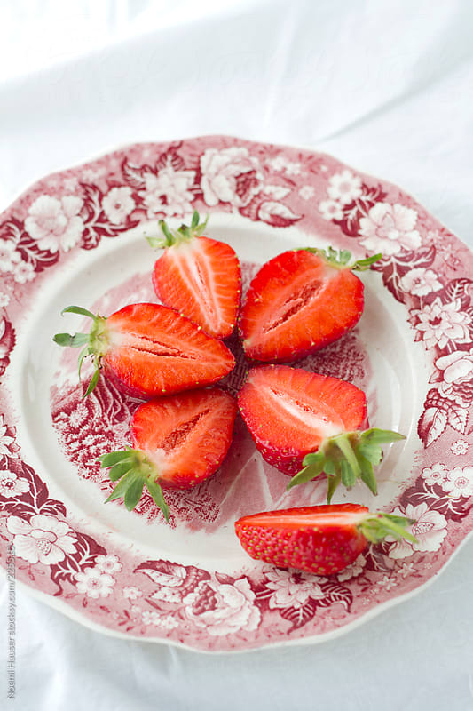 Halved strawberres by Noemi Hauser - Half, Strawberry - Stocksy United