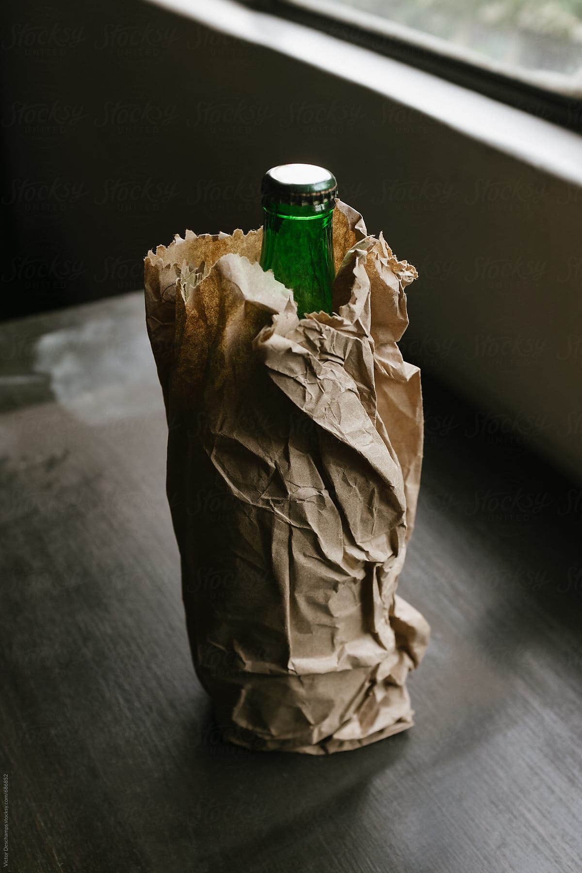 Beer Bottle Inside Paper Bag