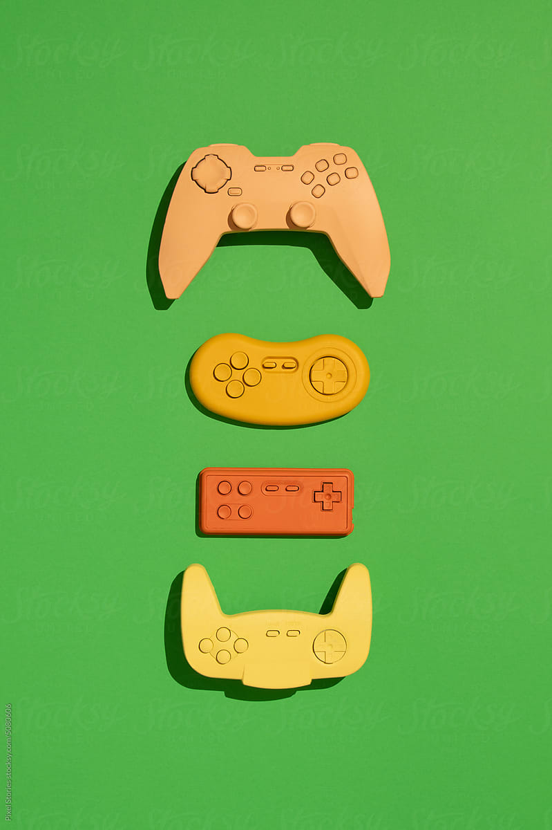 Vintage gaming consoles, controllers, joysticks, gamepads background