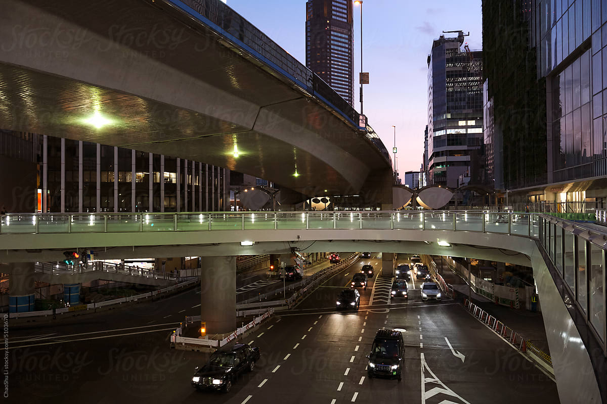 City buildings and overpasses, at dusk