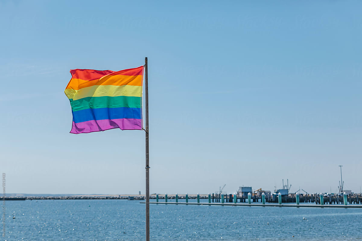 "Gay Pride Flag Flying In Provincetown Cape Cod" by Stocksy Contributor