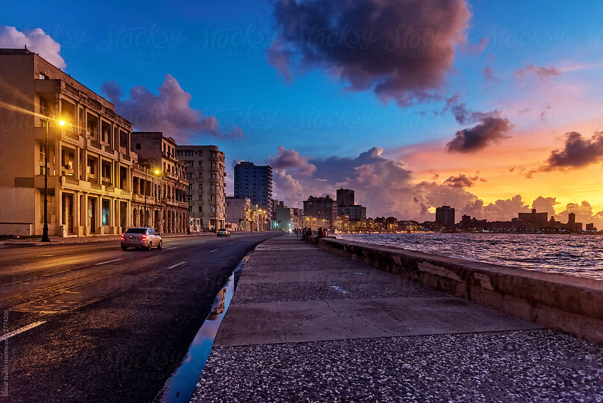 The Malecon At Sunset In Havana, Cuba" by Stocksy Contributor "Bisual  Studio" - Stocksy