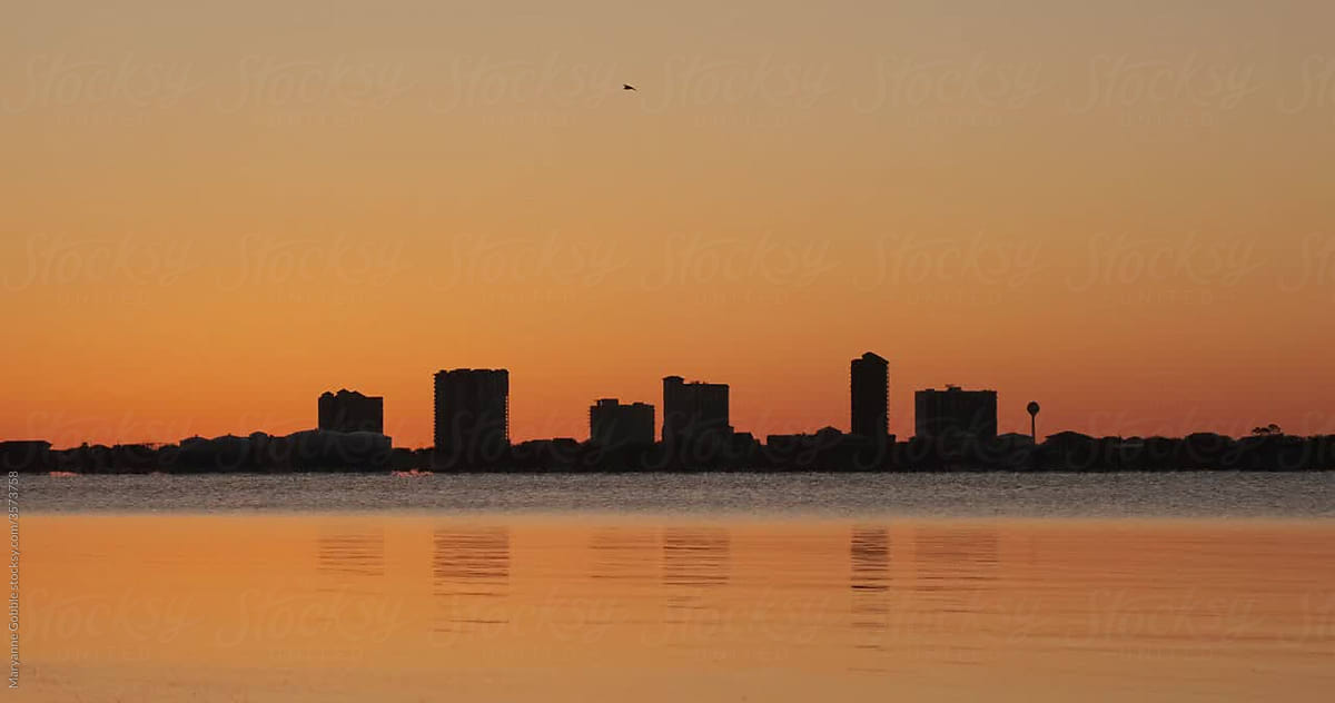 Pensacola Beach Waterfront Sunset Skyline By Stocksy Contributor