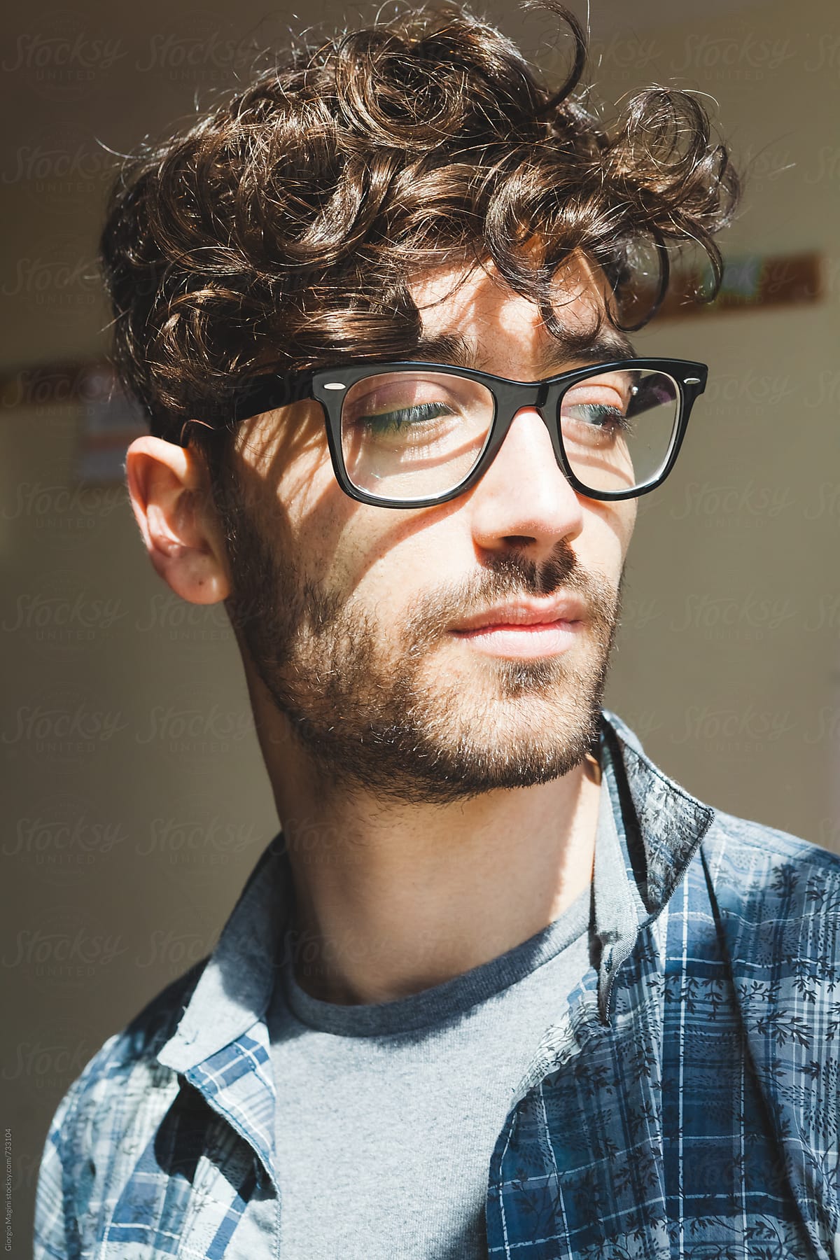 Kanon sandhed Vanding Portrait Of A Young College Student With Glasses" by Stocksy Contributor  "Giorgio Magini" - Stocksy