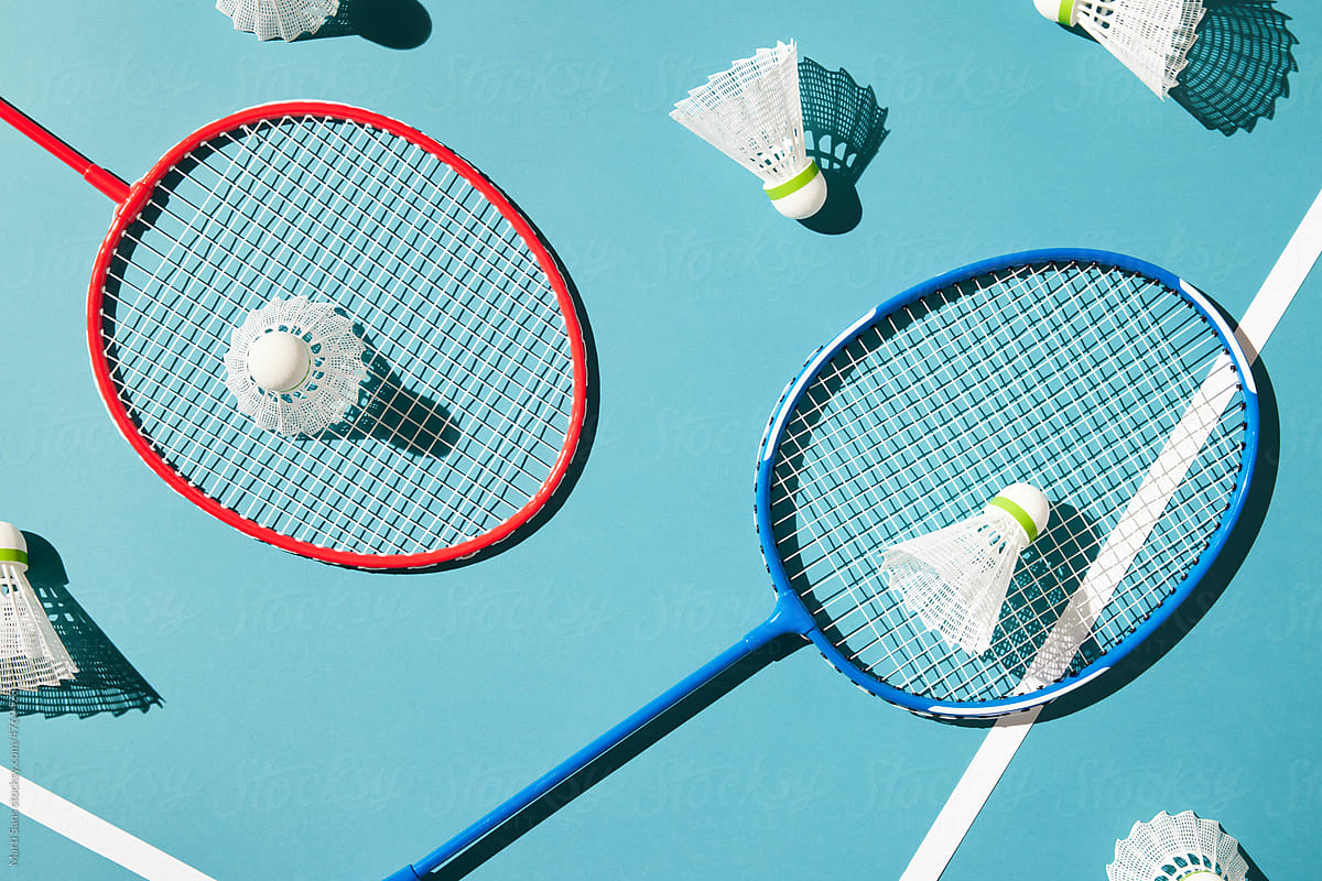 Badminton supplies on blue table