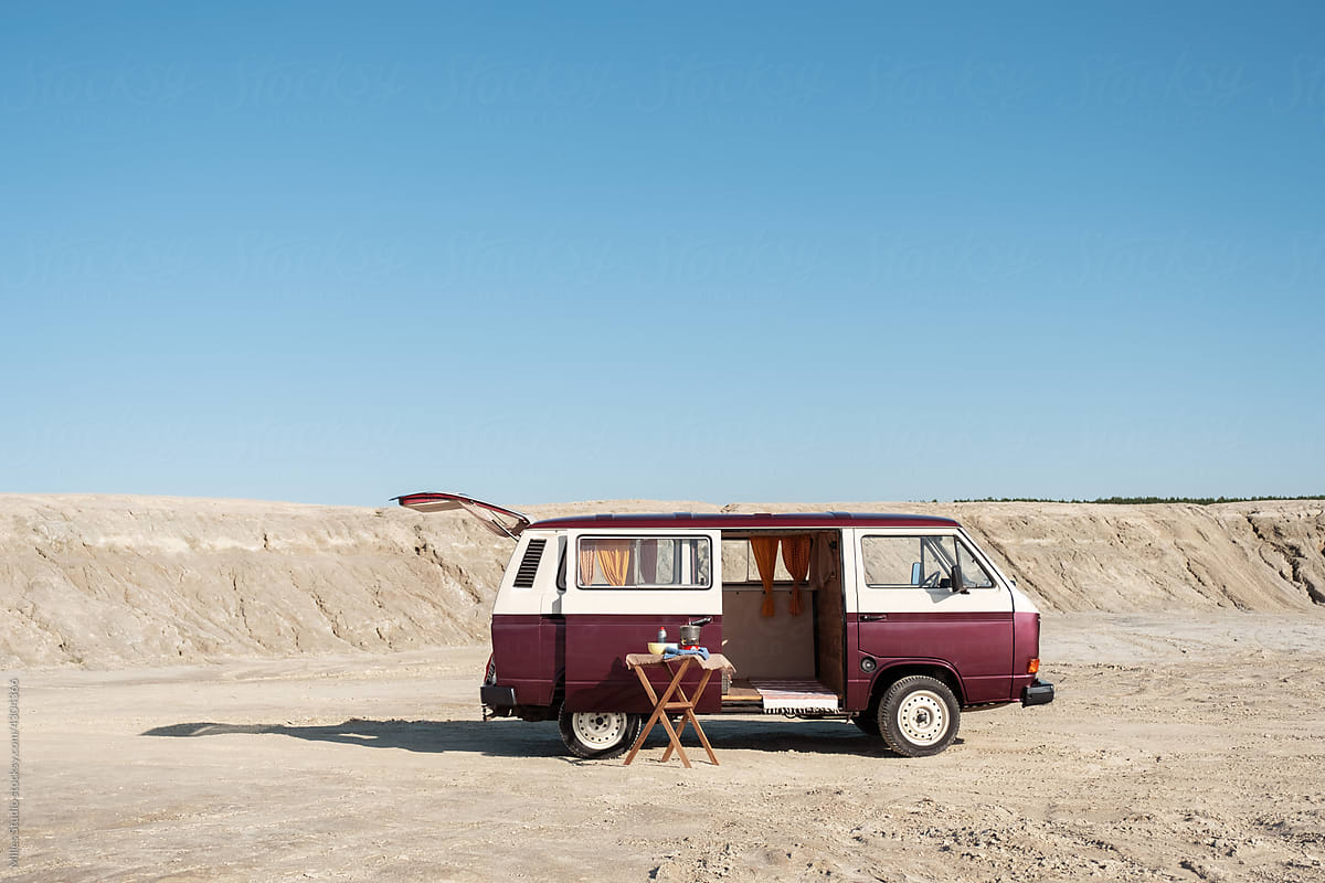 Camper on cloudless day in desert