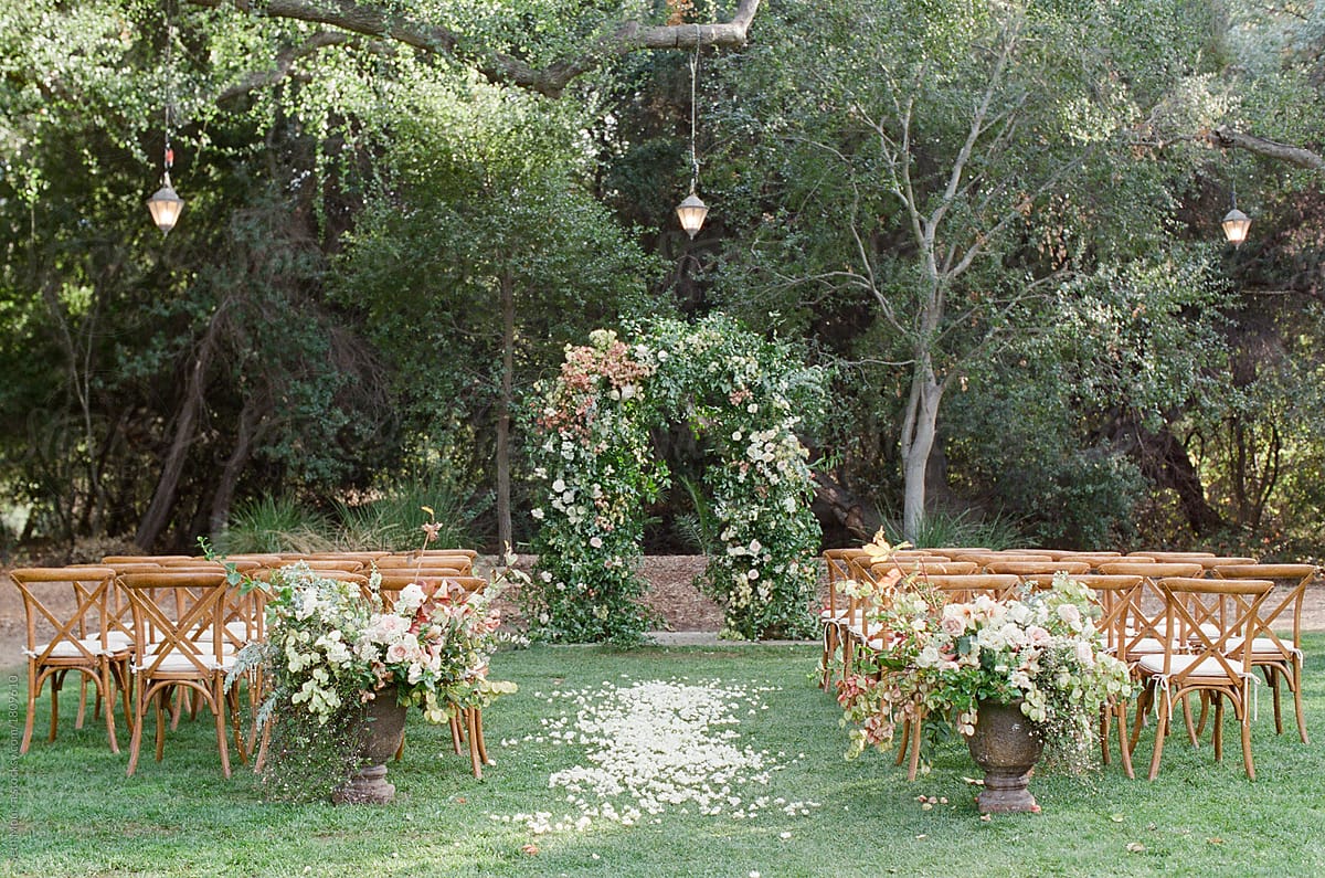 Outdoor, Tropical Wedding Reception With Hanging Greenery Garlands by  Stocksy Contributor Seth Mourra - Stocksy