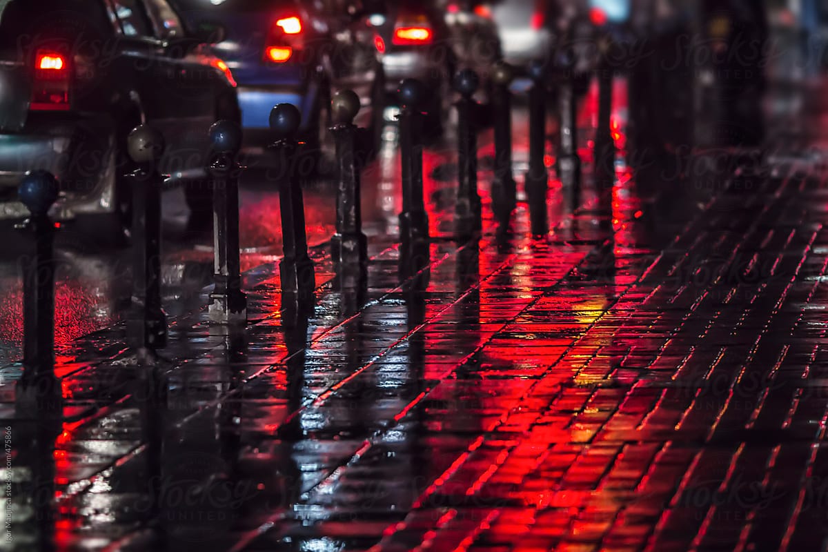 street atmosphere, rain, cars, red reflections, horizontal