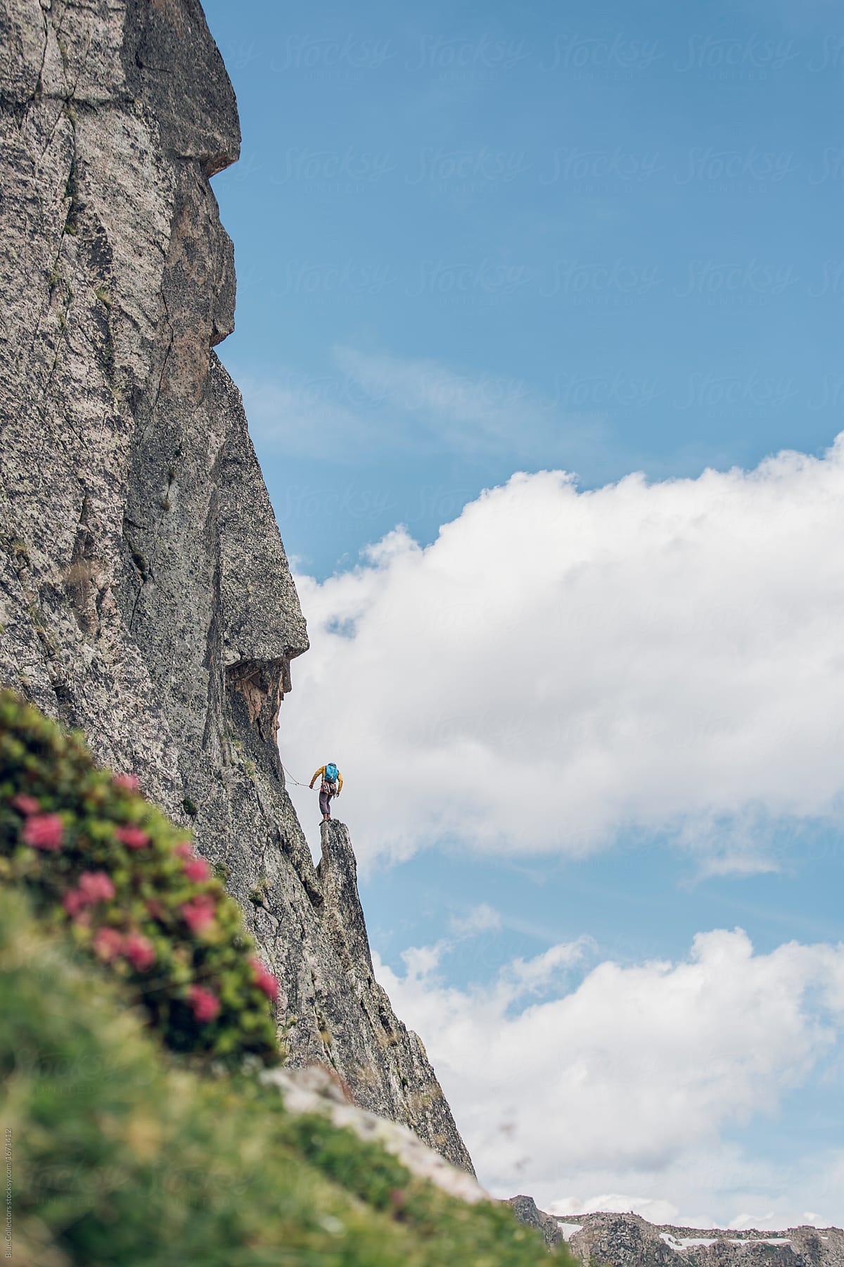 Sporty man climbing a mountain of the Pyrenees