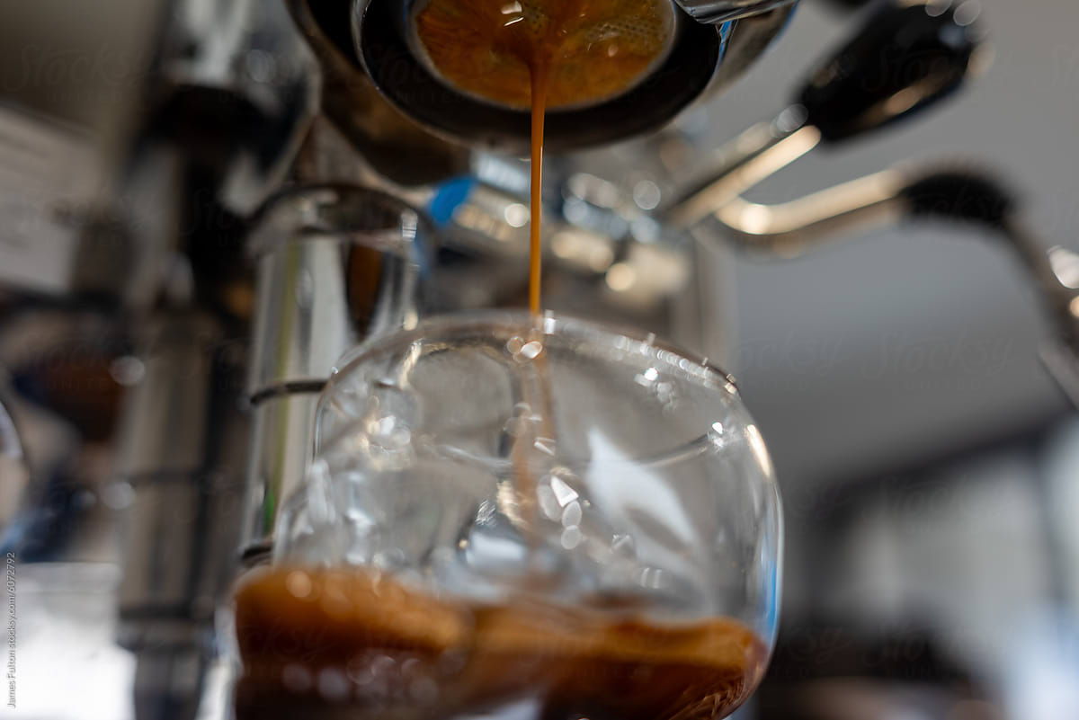 Espresso shot into a skull glass closeup.