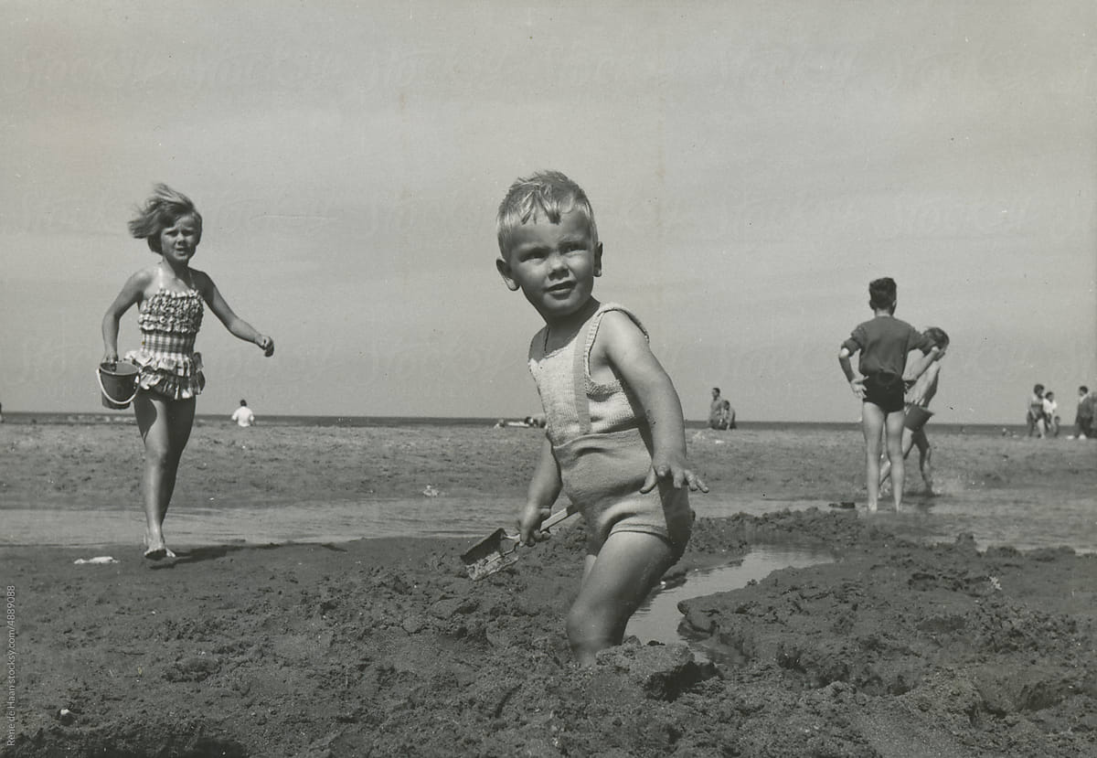 "boy playing at beach" by Stocksy Contributor "Rene de Haan"
