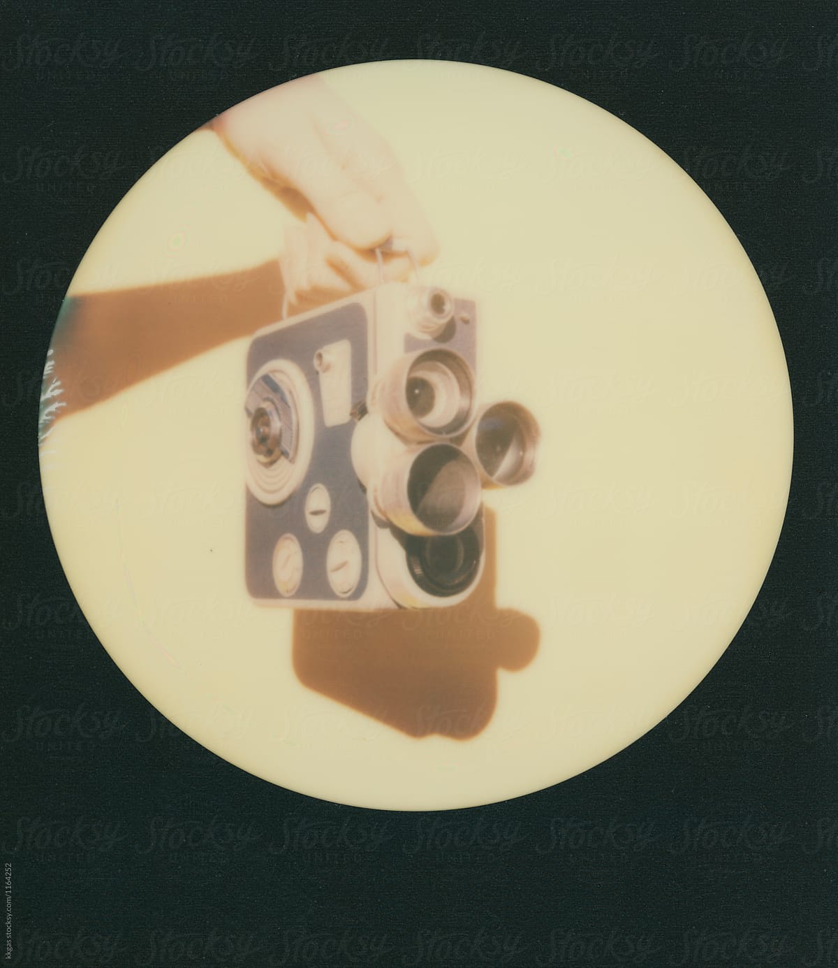 Polaroid print of a vintage cinecamera