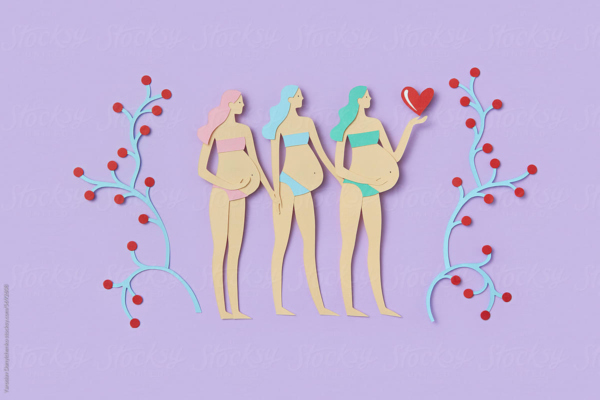 Three various figure of pregnant women holding heart shape in studio