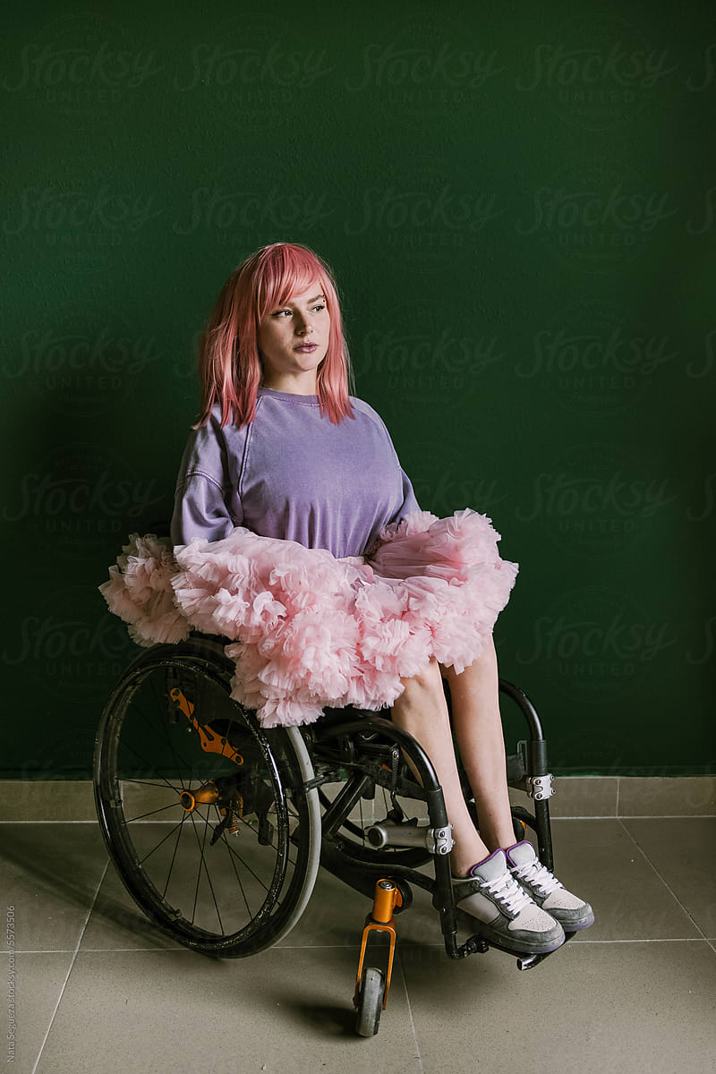 Portrait of a girl with a wheelchair