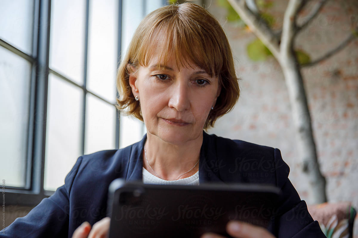 Professional woman using tablet