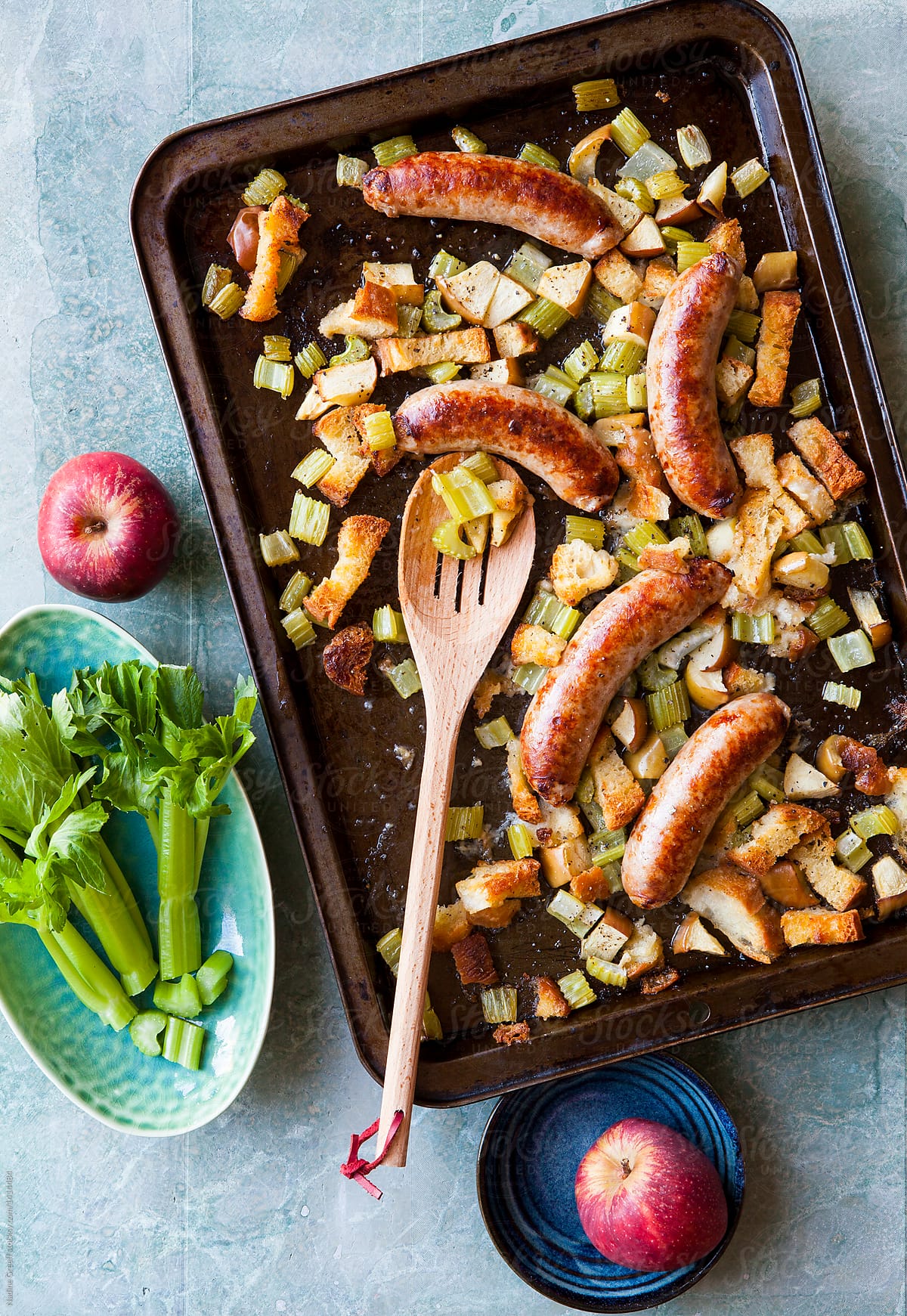 sausage tray bake with apple, celery and  crispy bread