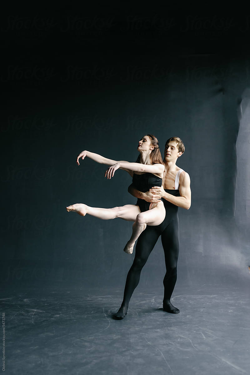 Couple dancers ballet workout. Training together. Pair flexible dance